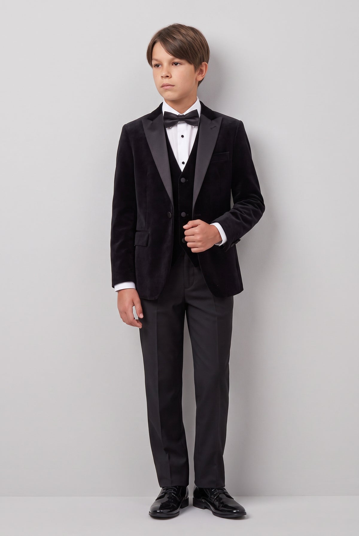 Boys Velvet Satin Lapel Tuxedo Dinner Suit Set - 4-Piece & 5-Piece - MAYFAIR - Black Model picture