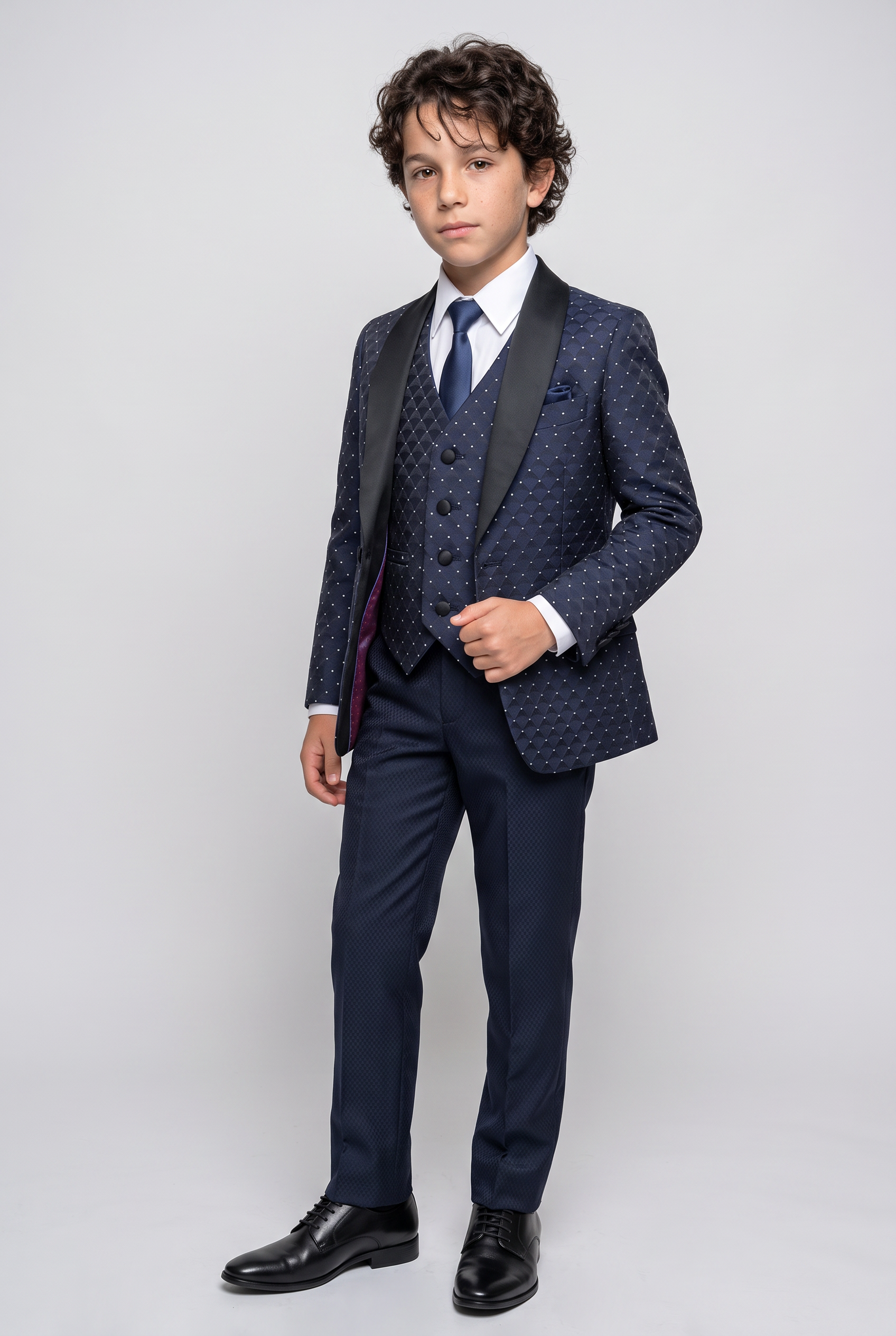 Abito da smoking blu navy trapuntato a pois per ragazzi