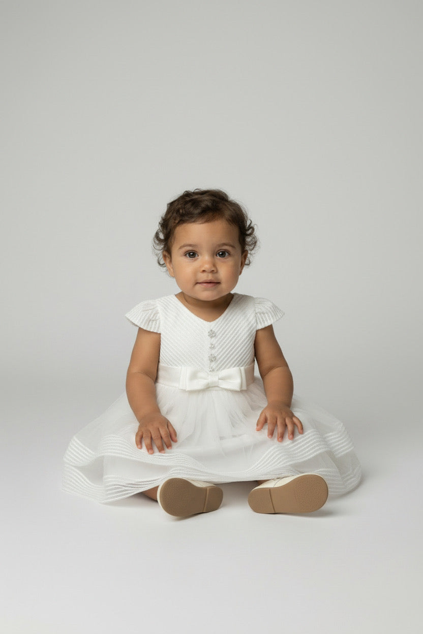 Robe en tulle ivoire pour bébé fille avec ceinture en satin nouée