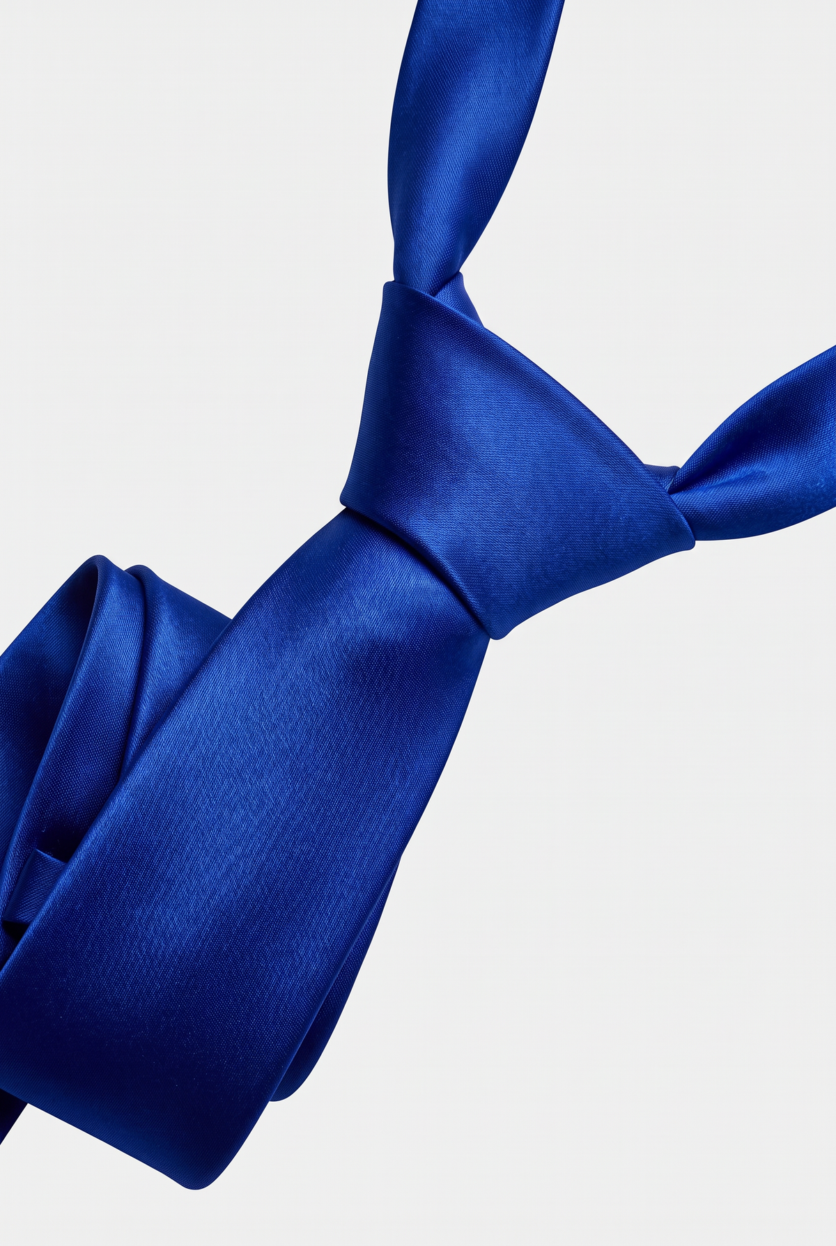 Royal Blue satin necktie showing knot and fabric texture close-up