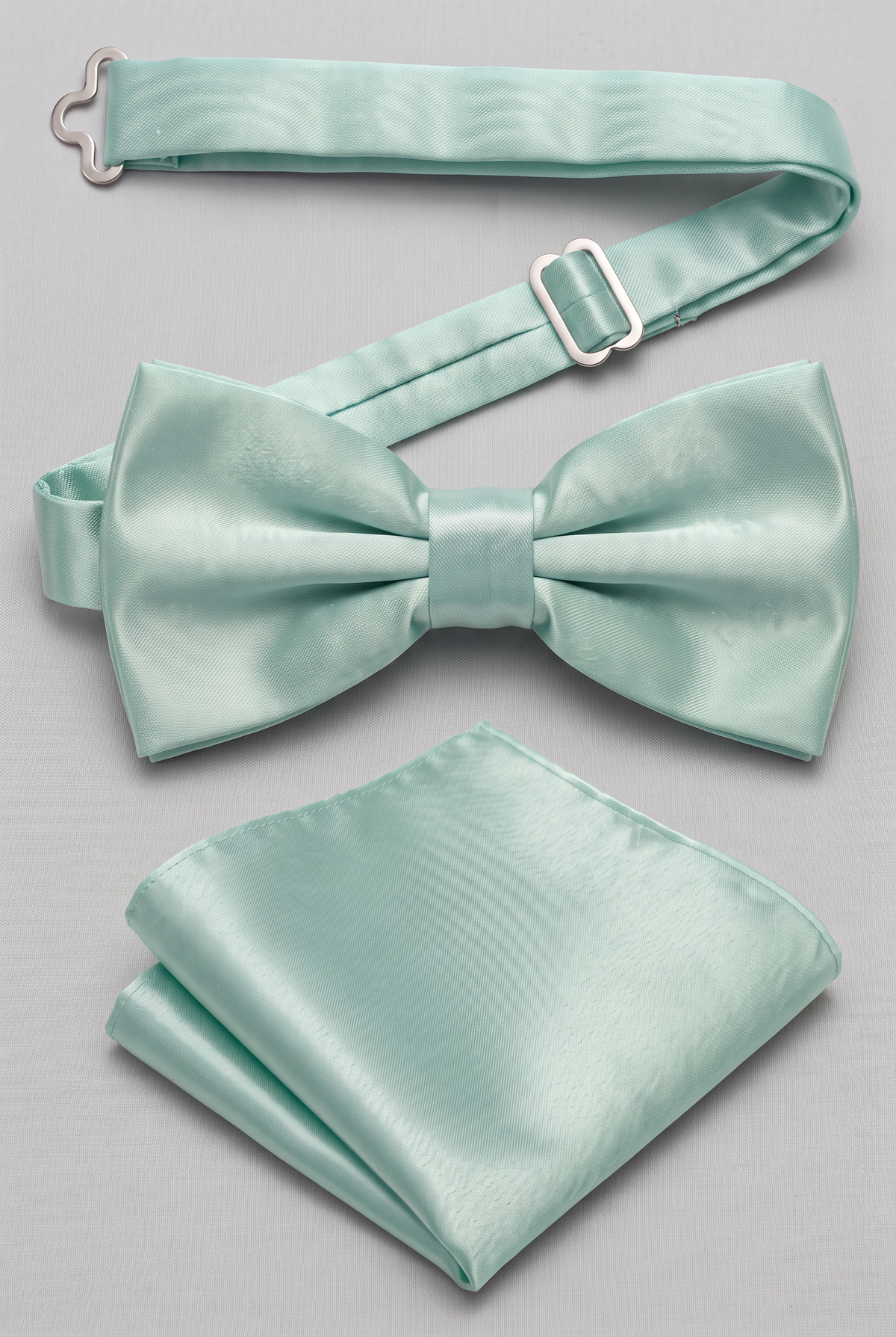Men’s mint satin pre-tied bow tie with adjustable neck strap and matching pocket square