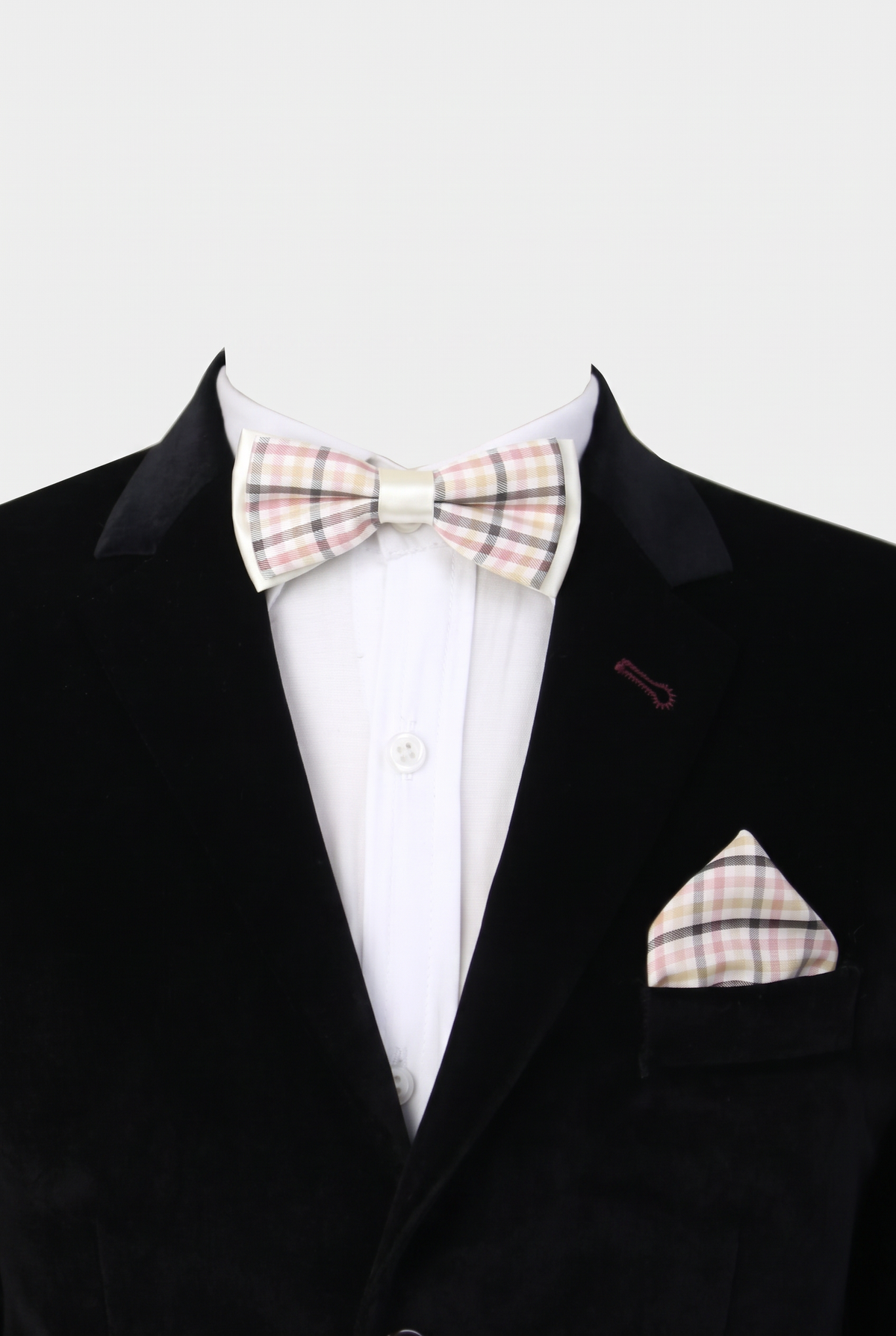   Boys checkered bow tie and matching pocket square styled with a formal suit in pink and black
