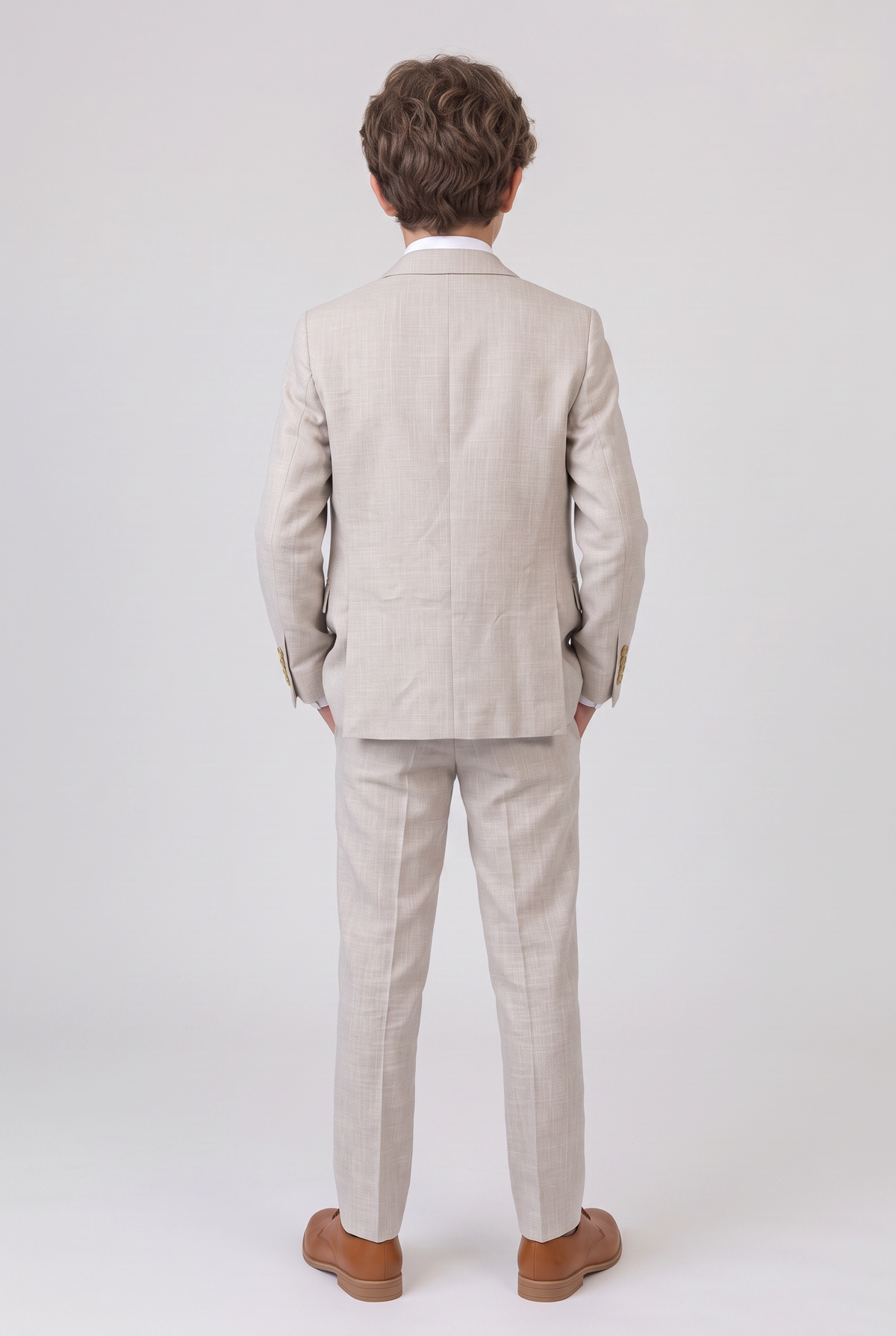 Back view of beige three-piece suit for boys