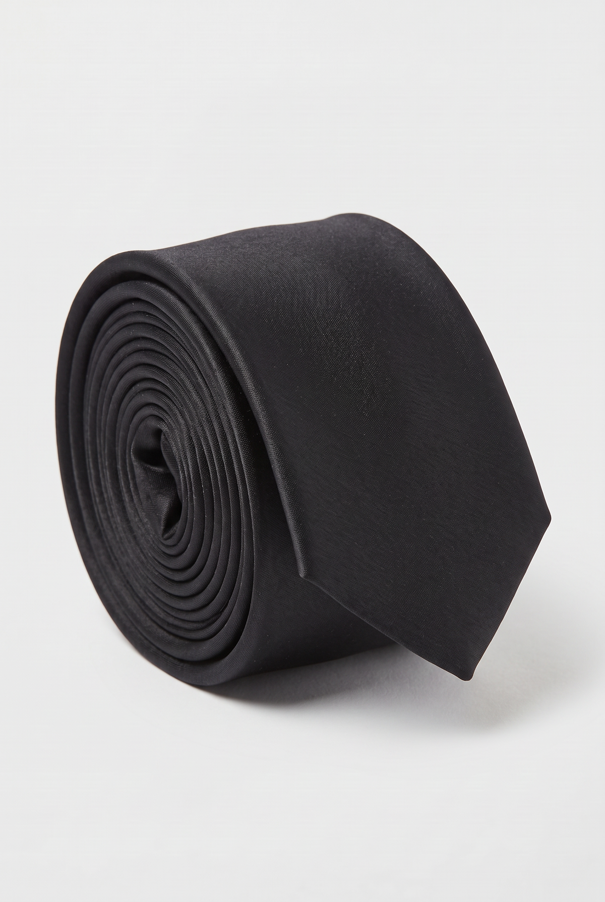 Black satin men's necktie, rolled close-up view 