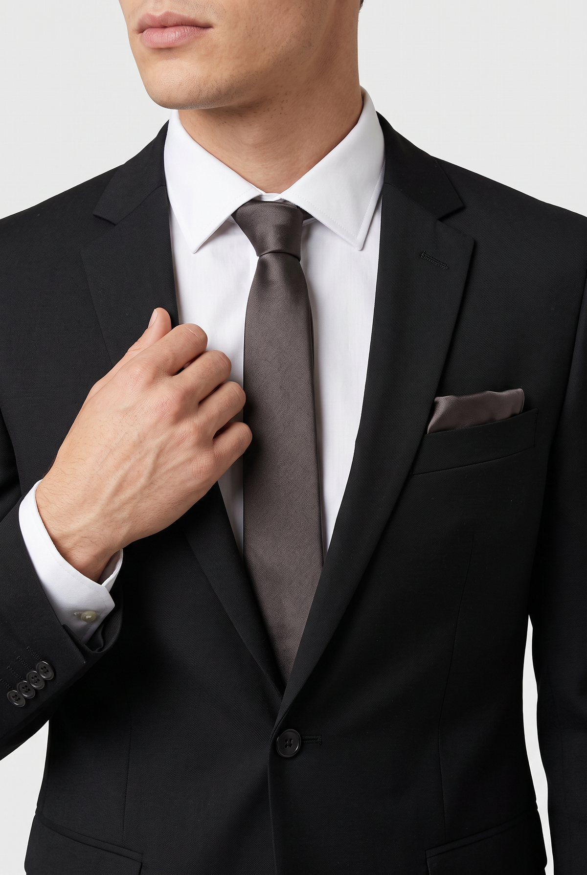Dark Silver satin tie and pocket square styled with a black  suit