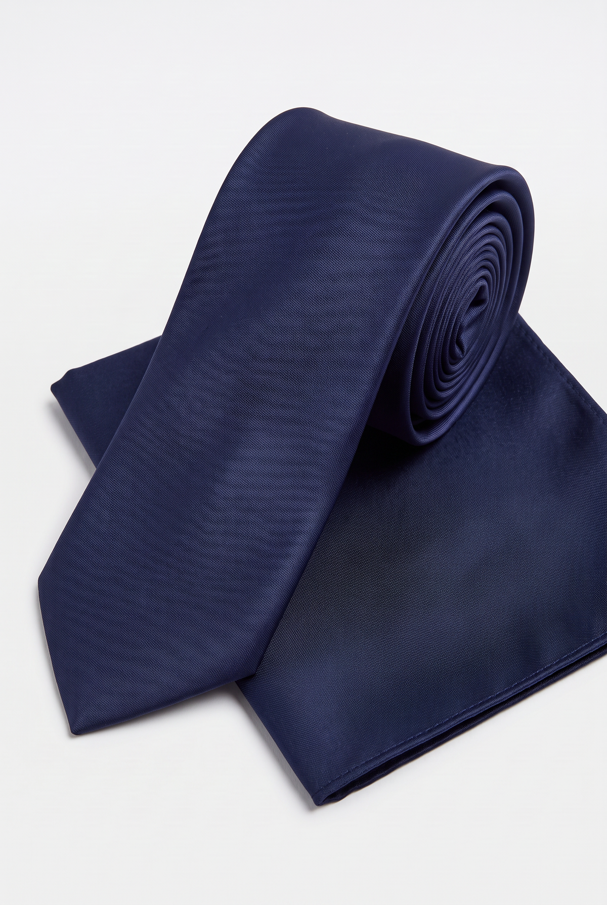 Navy satin tie and matching pocket square set, rolled view 