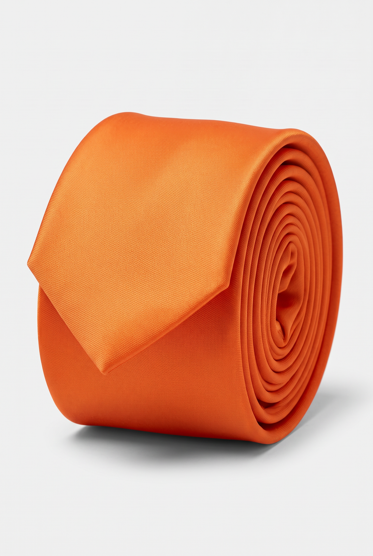 Orange satin men's necktie, rolled close-up view 
