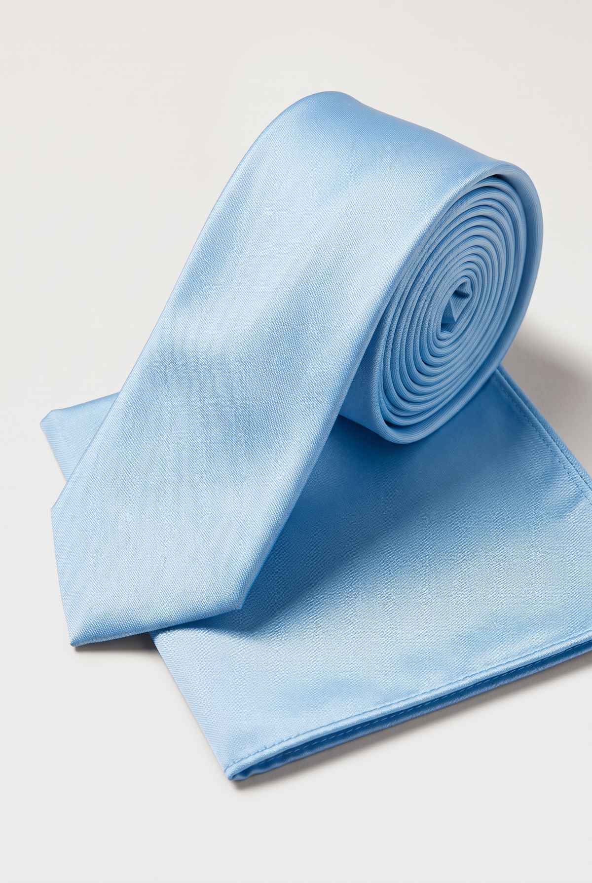Sky Blue satin tie and matching pocket square set, rolled view 