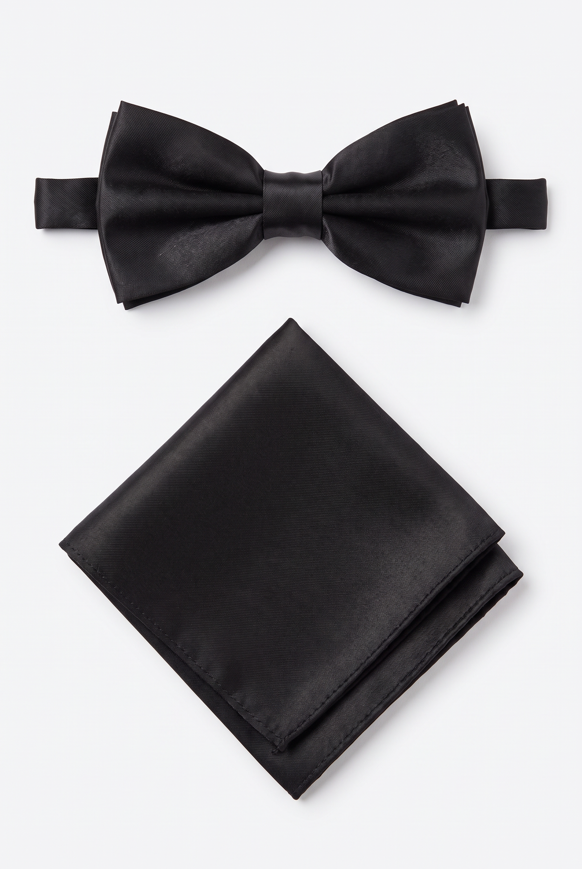 Black satin men’s bow tie and matching pocket square set for formal wear
