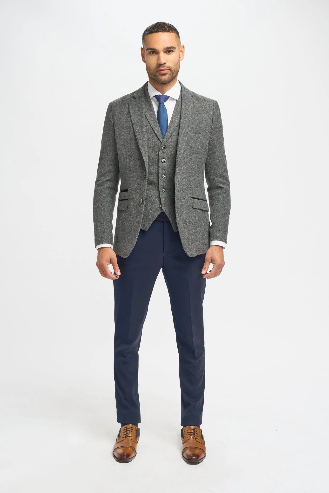 Men's Grey Herringbone Tweed Jacket and Waistcoat with Slim Fit Navy Blue Trousers - Grey - Navy Blue